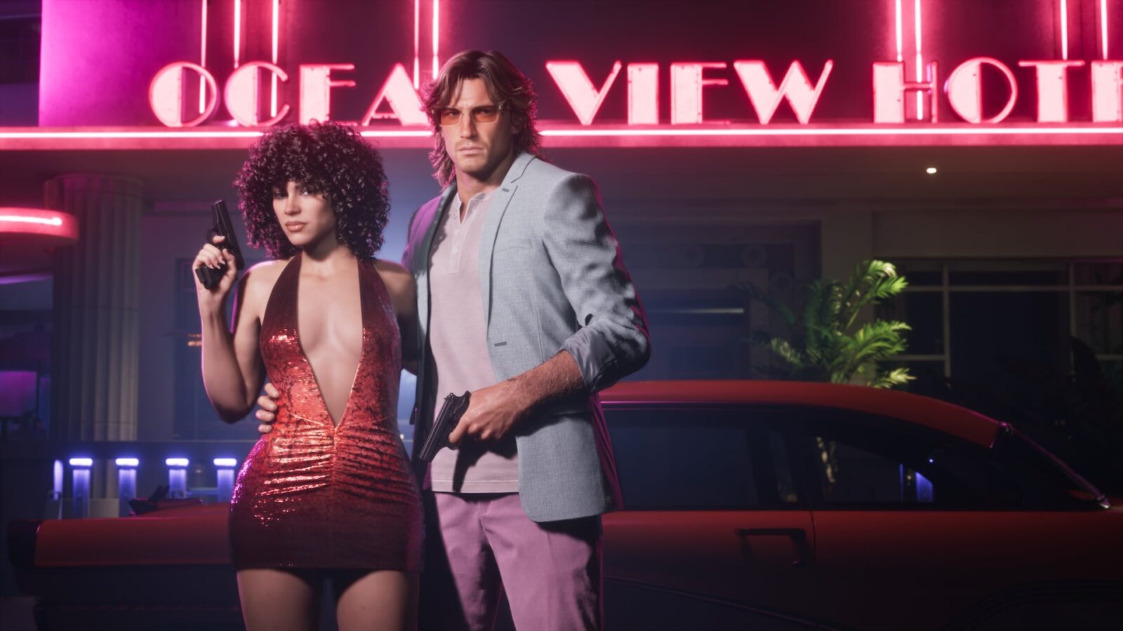 Official Grand Theft Auto VI image of Lucia and Jason posing in front of a neon Ocean View Hotel sign, from the Vintage Vice City Pack