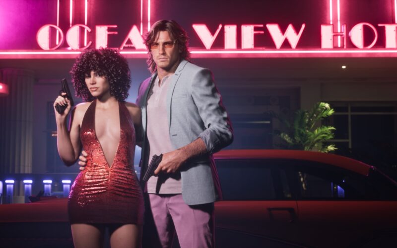 Official Grand Theft Auto VI image of Lucia and Jason posing in front of a neon Ocean View Hotel sign, from the Vintage Vice City Pack