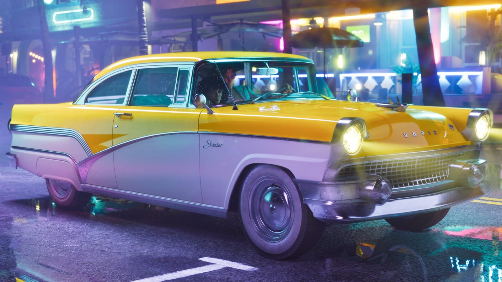 Official Grand Theft Auto VI image of a yellow and white Vapid Stanier with two people inside, driving down a neon-lit wet street