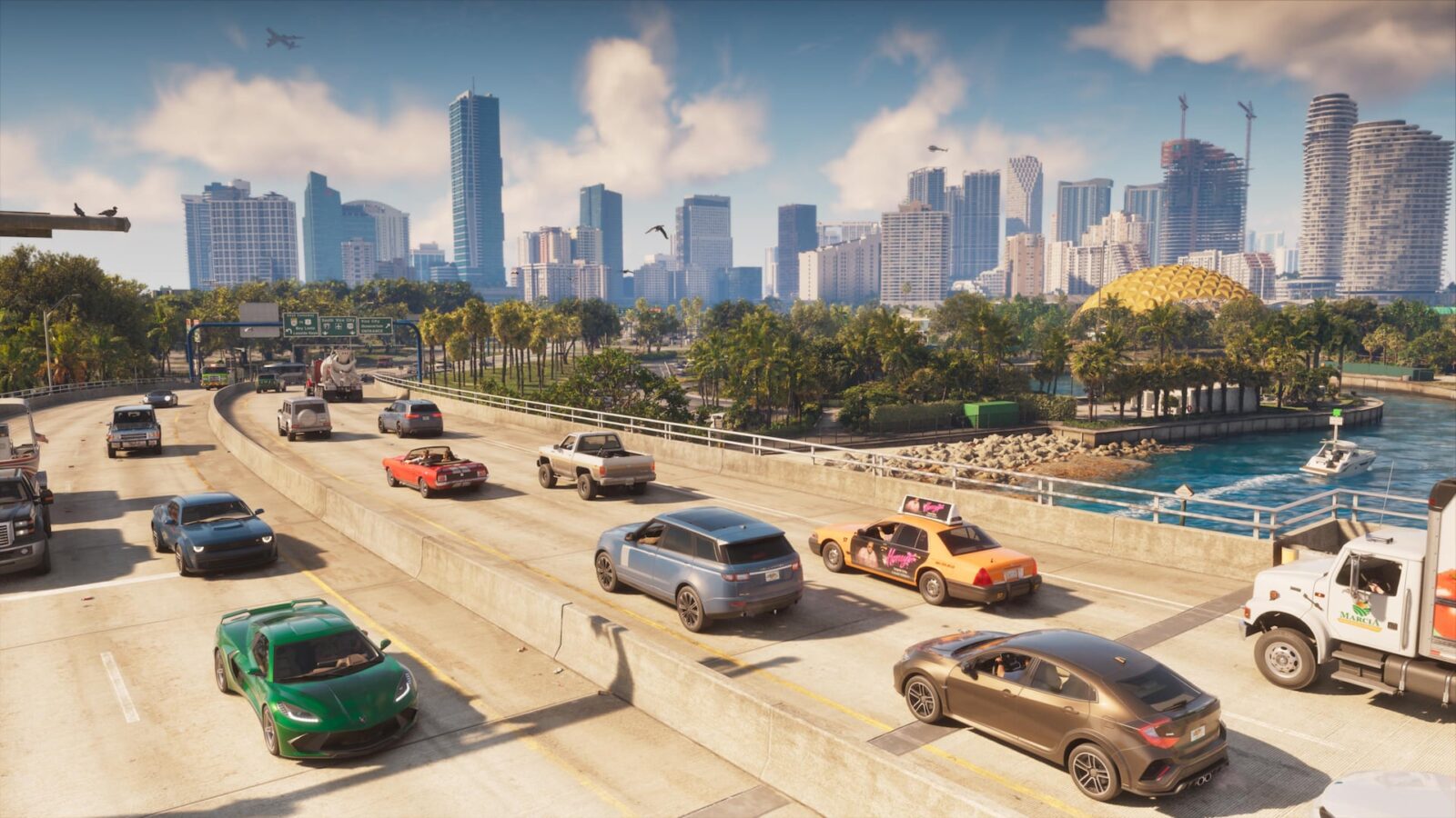 Official Grand Theft Auto VI screenshot of a busy Vice City bridge with the skyline behind it and branded vehicles in traffic, including a taxi with an ad on its roof